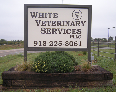 White Veterinary Services sign. White Veterinary Services sign.